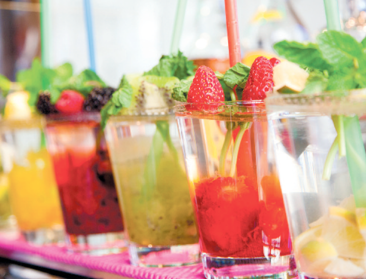 colorful alcoholic cocktails in a row