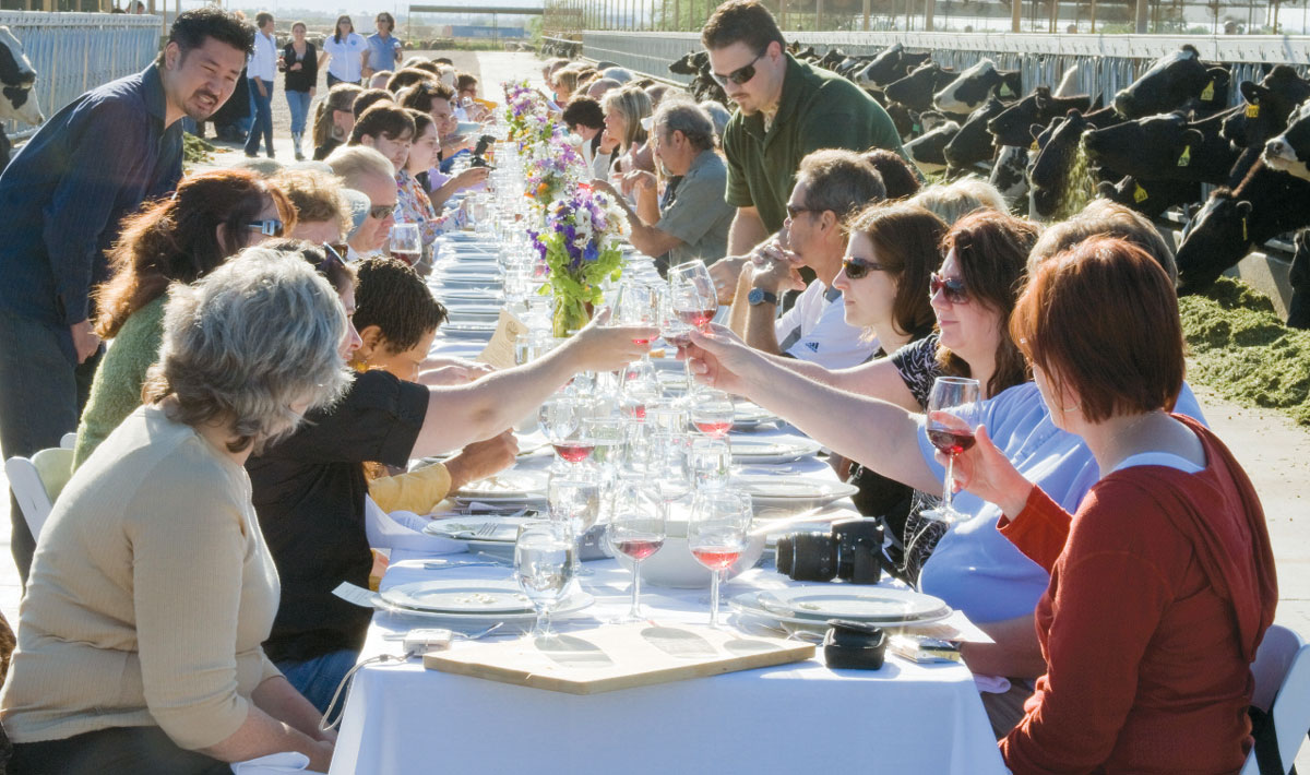 People dining at a long table