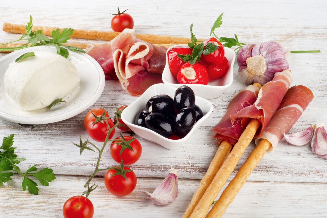 antipasti, olives, ham, breadsticks