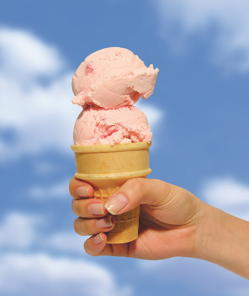 Two scoops of ice cream on a cone