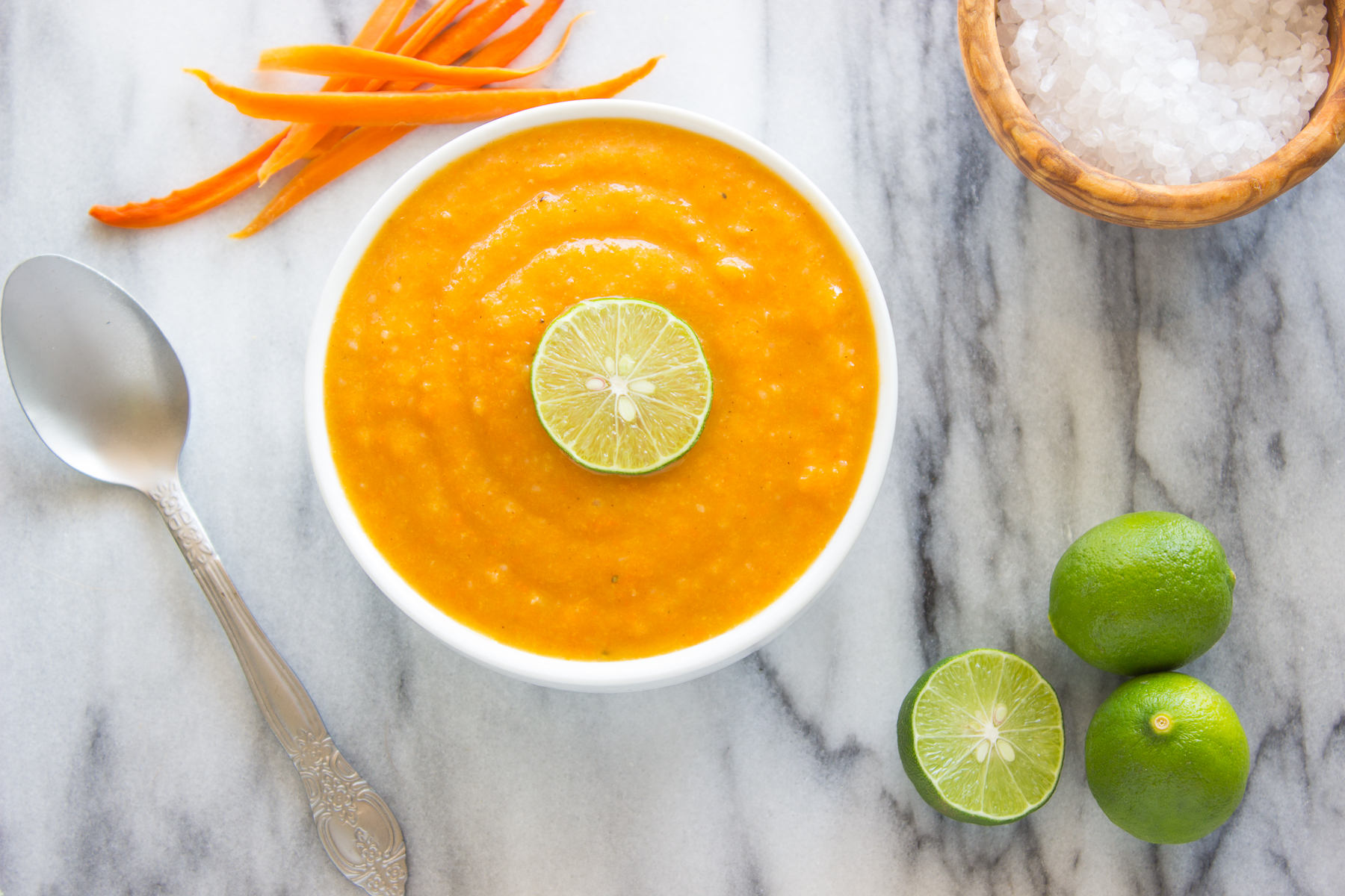 Carrot soup garnished with lime