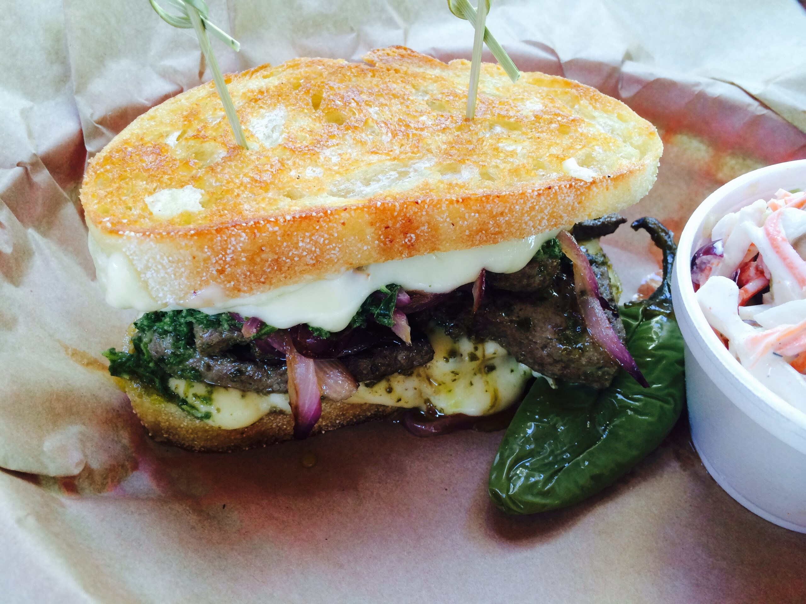 Sage Chimichurri Beef Liver Sandwich with Grilled Onions and Fontina Cheese